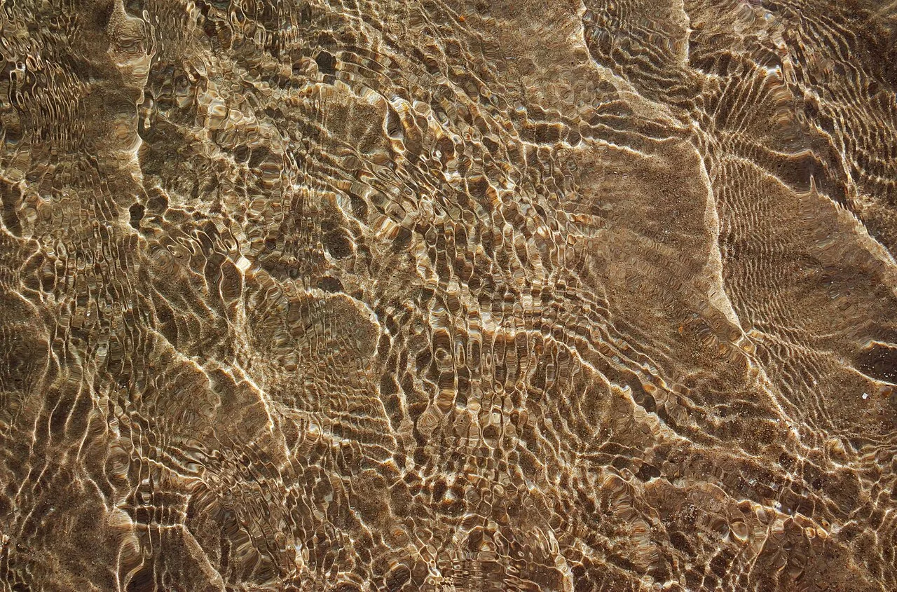 Ripples in shallow water at São João Beach, Costa da Caparica