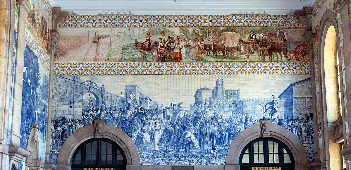 Blue-and-white tile mural above the ticket-office doorway at São Bento station