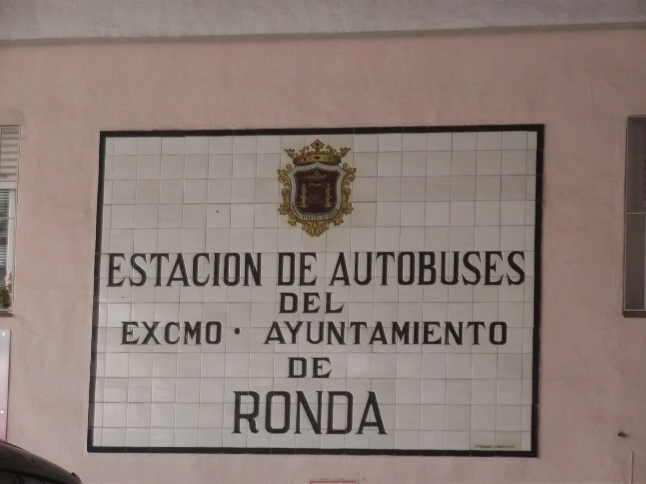 Tiled sign identifying Ronda's municipal bus station
