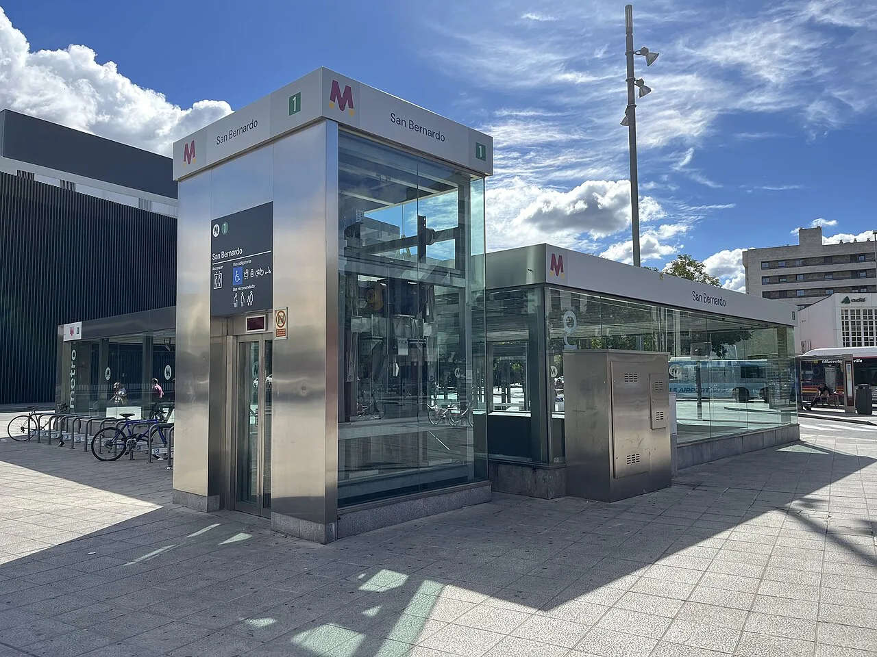 Signed San Bernardo Metro entrance and lift beside the surface transport interchange